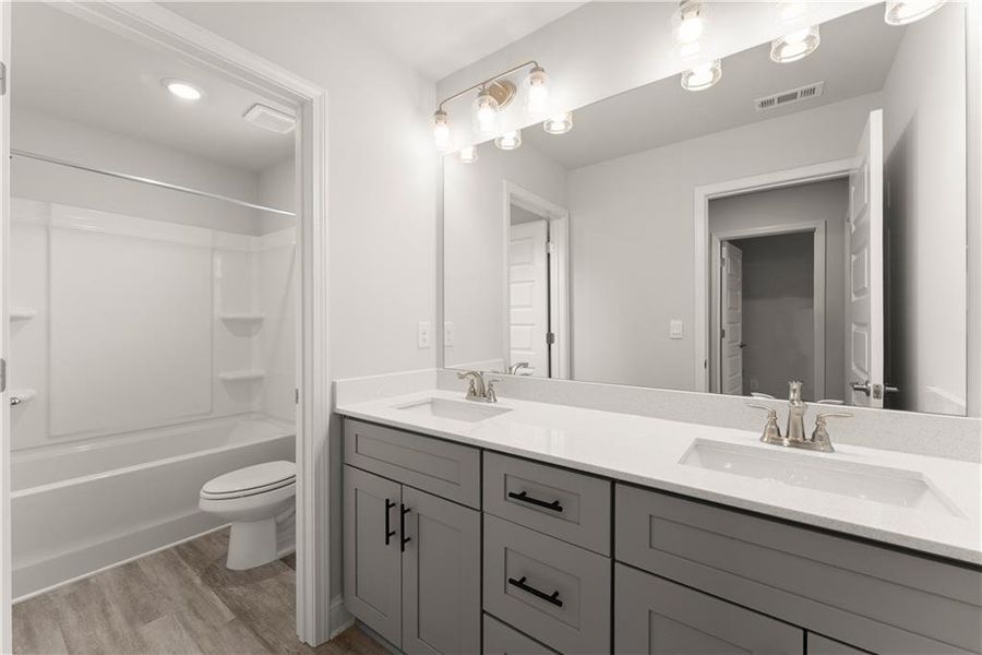 Furnished interior view inside a new home in Magnolia Villas, Cornelia (Image 12).