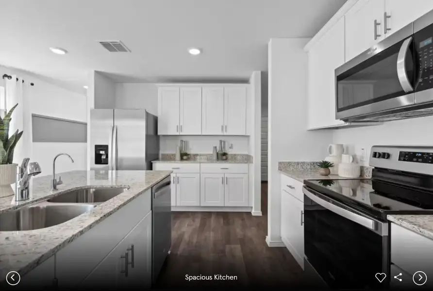 Interior photos- Photo of Pulte model home with same floor plan, not of actual home listed.