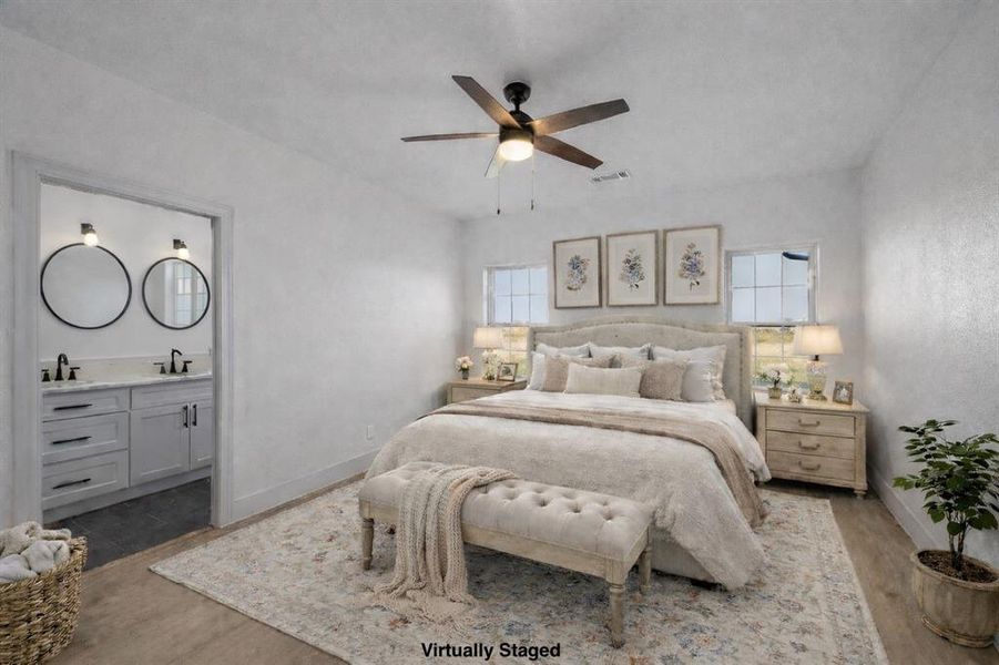 Bedroom featuring a ceiling fan and wood finished floors