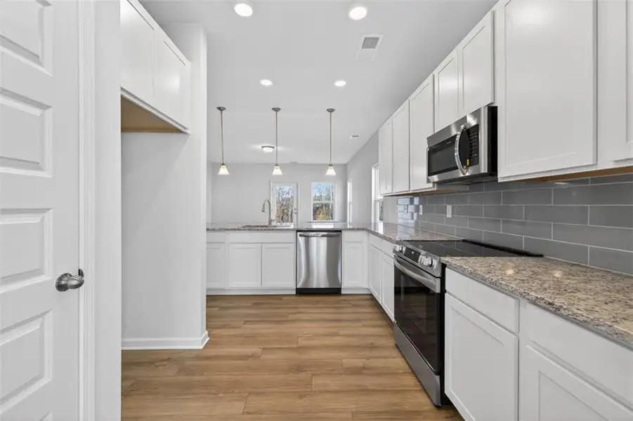 Furnished interior view inside a new home in Roxeywood Park, Winder (Image 5).