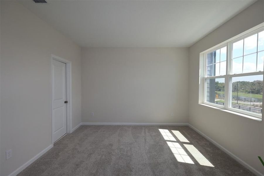 Spacious, unfurnished interior of a new home in Center Lake on the Park, St. Cloud (Image 15).