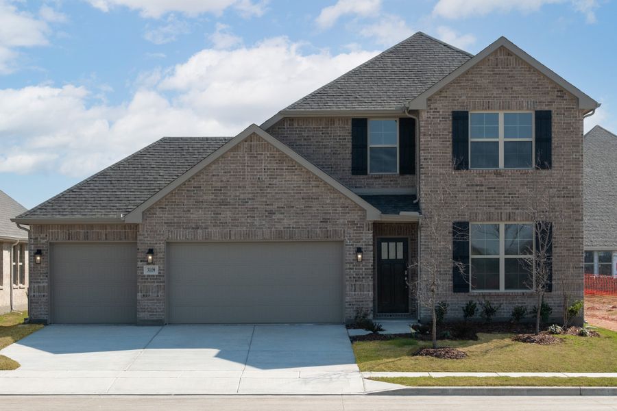 Front exterior of a new home in Verandah, Royse City, TX, highlighting curb appeal (Image 1). Front exterior of a new home in Verandah, Royse City, TX, highlighting curb appeal (Image 1).