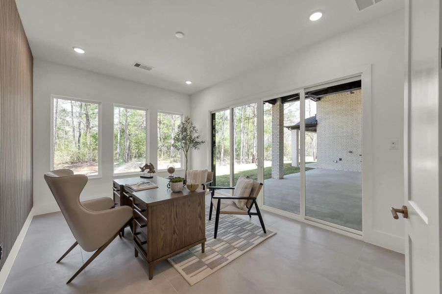 A dedicated study provides a quiet, light-filled space ideal for working from home or creative pursuits.