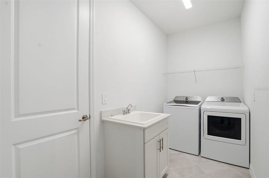 Furnished interior view inside a new home in Wellen Park Golf & Country Club, Venice (Image 9).