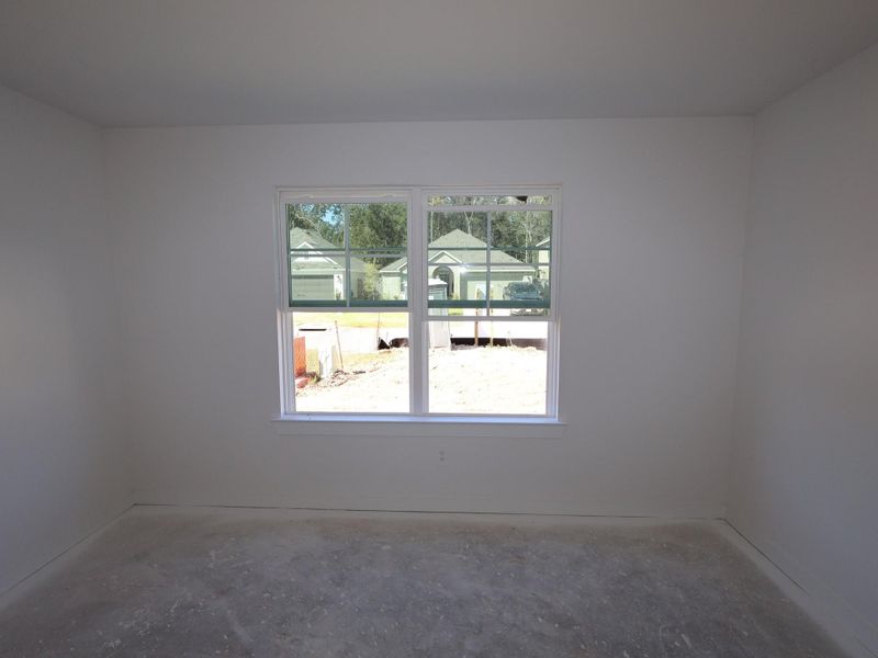 Spacious, unfurnished interior of a new home in Pinewood at Grand Texas, New Caney (Image 8).