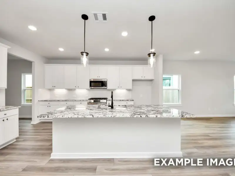 Furnished interior view inside a new home in Sundance Cove, Crosby (Image 9).