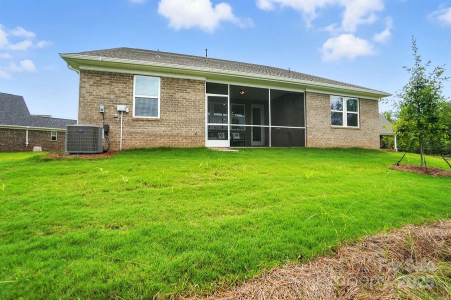 Front exterior of a new home in Sonata at Mint Hill, Mint Hill, NC, highlighting curb appeal (Image 2). Front exterior of a new home in Sonata at Mint Hill, Mint Hill, NC, highlighting curb appeal (Image 2).