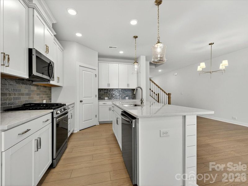 Furnished interior view inside a new home in North Creek Village - Townhomes, Huntersville (Image 5).