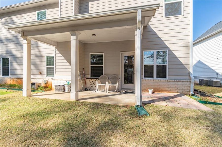 Exterior details and patio area of a home in Enclave at Brookside Crossing, Auburn (Image 3).