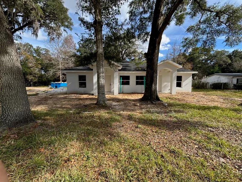 Exterior details and patio area of a home in , Williston (Image 3).