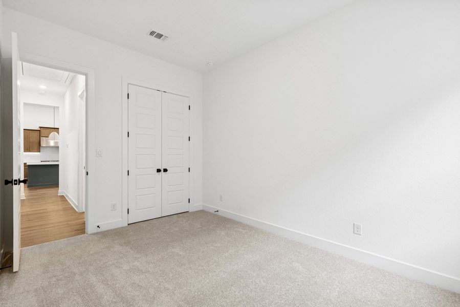 Representative unfurnished interior of a home built from the The Beeville by David Weekley Homes in Wolf Ranch – West Bend, Georgetown (Image 7).