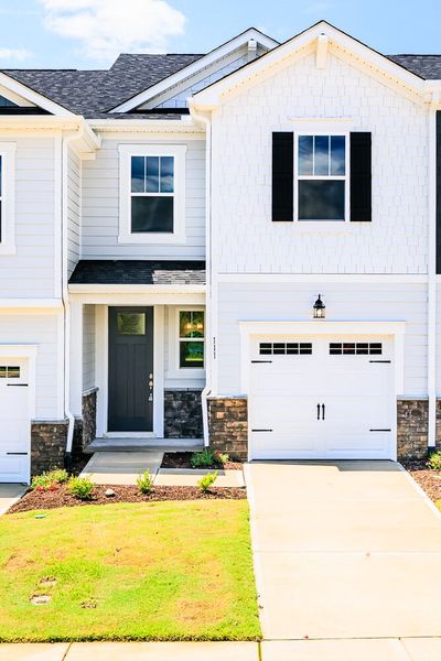 Front exterior of a new home in Vaughan Farms, Angier, NC, highlighting curb appeal (Image 2).