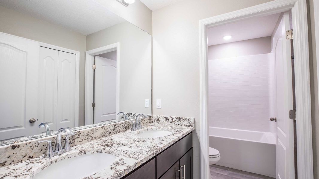 Representative furnished interior of a home built from the Columbus by Maronda Homes in Bella Estates, Plant City (Image 5).