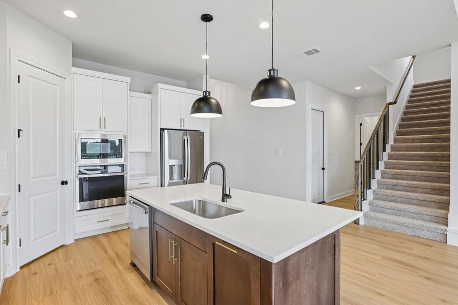 Furnished interior view inside a new home in 6 Creeks, Kyle (Image 10).
