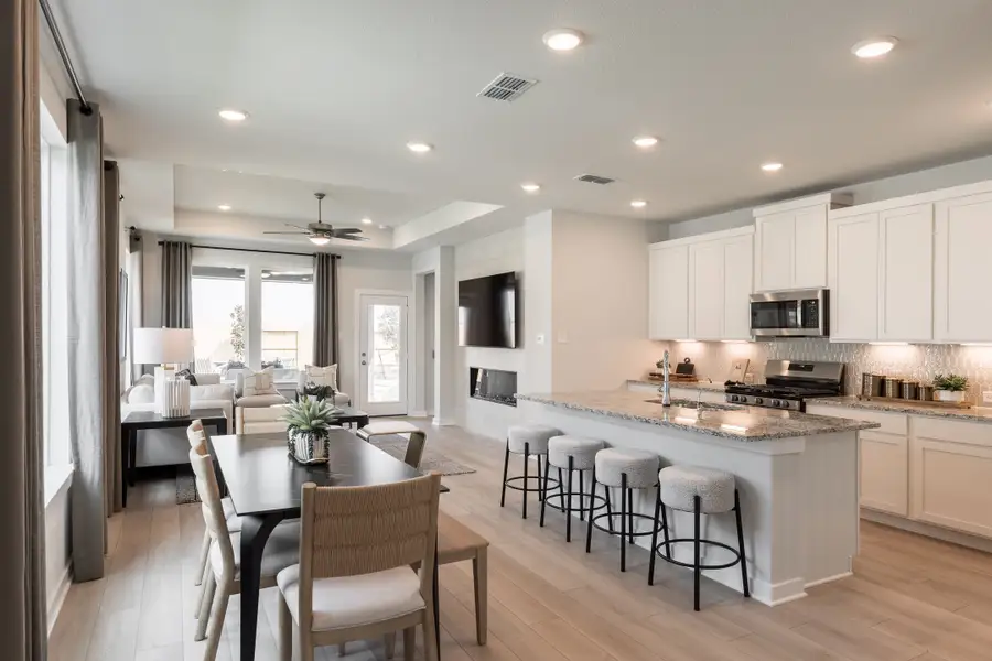 Furnished interior view inside a new home in Mason Woods, Cypress (Image 3).
