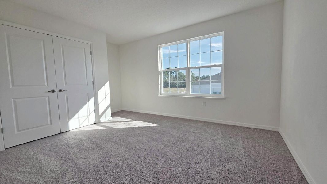 Spacious, unfurnished interior of a new home in Island Forest Preserve, Merritt Island (Image 13).