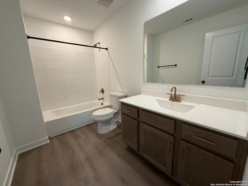 Furnished interior view inside a new home in The Preserve at the Wilder, Adkins (Image 12).