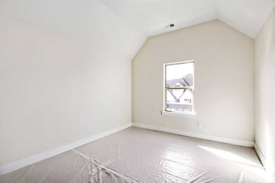 Bonus room with baseboards Bonus room with baseboards