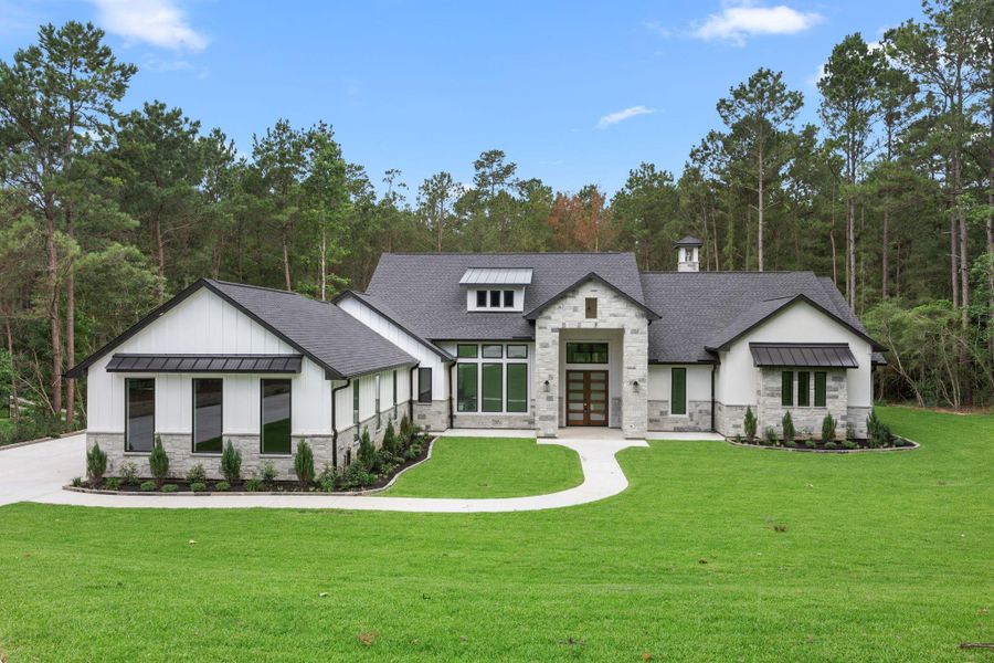 Front exterior of a new home in , Montgomery, TX, highlighting curb appeal (Image 28).