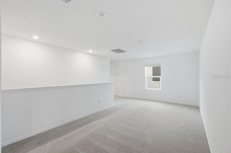Spacious, unfurnished interior of a new home in Waterstone, Groveland (Image 46).