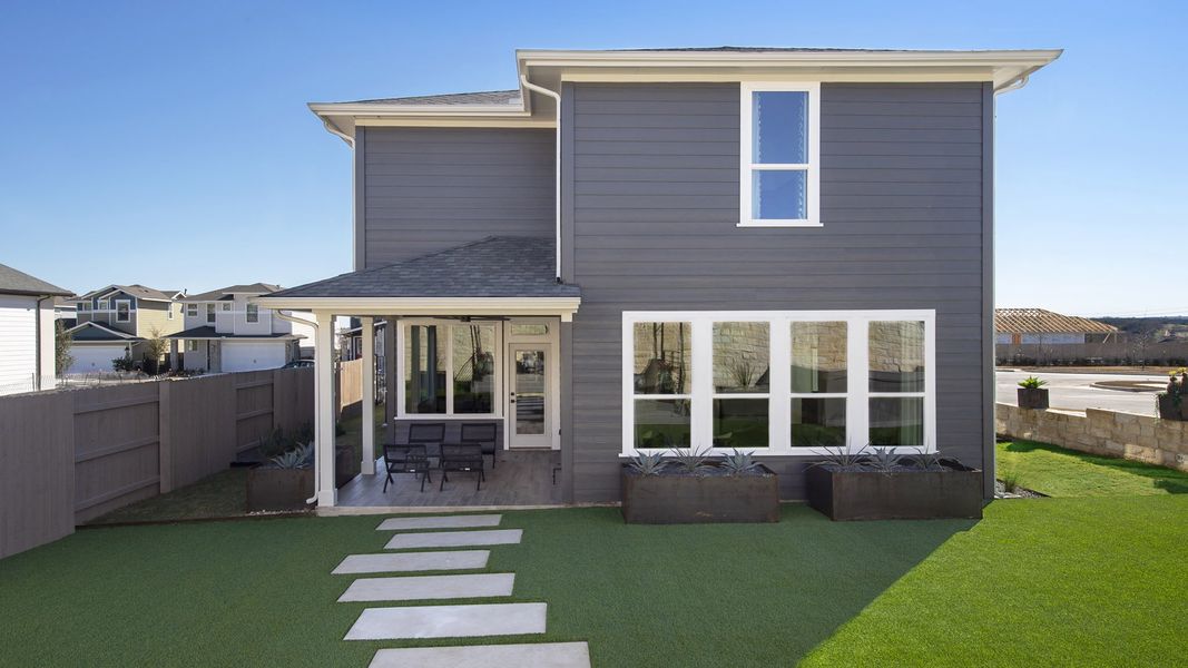 Representative exterior photo of a completed home built from the 2412E by Perry Homes in The Parklands 40'/50', Schertz, TX (Image 7).