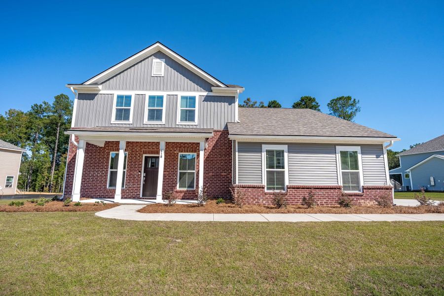 Front exterior of a new home in Oakleaf Chase, Blythewood, SC, highlighting curb appeal (Image 22).