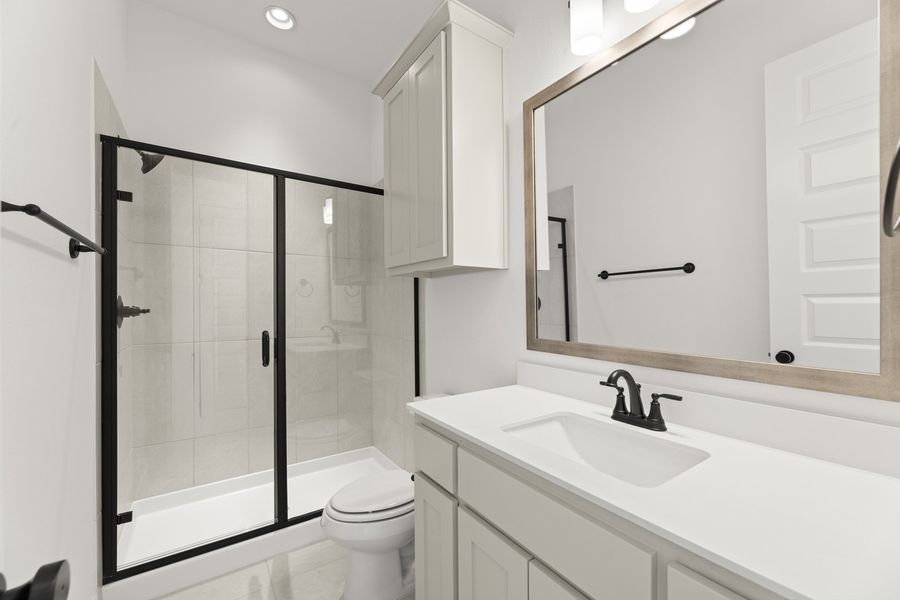 Representative furnished interior of a home built from the Hadley by Windsor Homes in Winding Creek, Rockwall (Image 12).