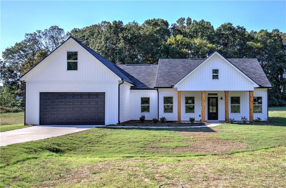 Front exterior of a new home in , Taylorsville, GA, highlighting curb appeal (Image 1).