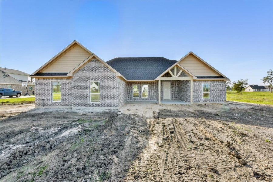 Front exterior of a new home in , Baytown, TX, highlighting curb appeal (Image 1). Front exterior of a new home in , Baytown, TX, highlighting curb appeal (Image 1).