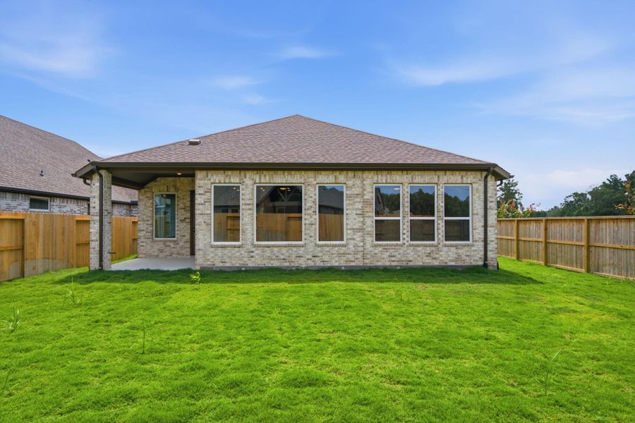 Exterior details and patio area of a home in The Highlands, Porter (Image 27).