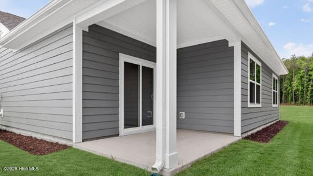 Exterior details and patio area of a home in Tyler - Home on the Lake, New Bern (Image 4).
