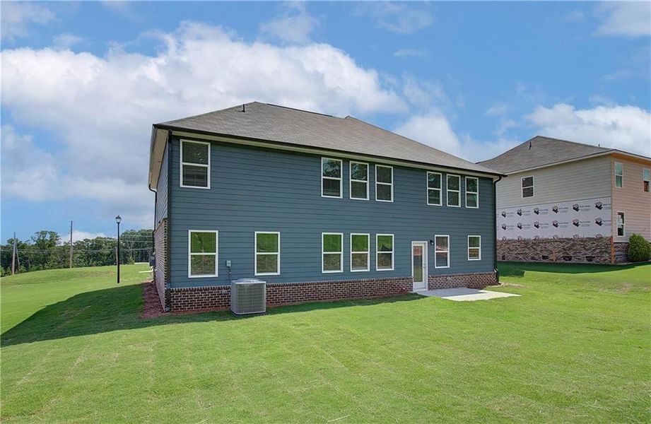 Exterior details and patio area of a home in Kingsmere Estates, Loganville (Image 3).