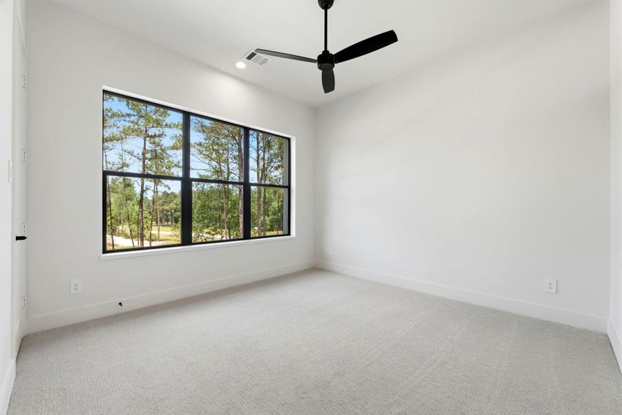 Bedroom #3 (Located Upstairs) Painted Light and BRIGHT, PLUSH carpet, and black ceiling fan!