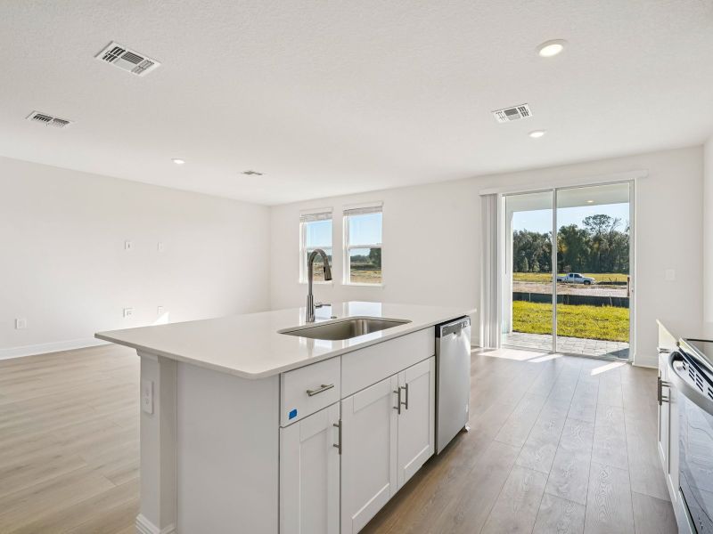 Furnished interior view inside a new home in The Reserve at Hammock Oaks - Signature Series, Lady Lake (Image 6).