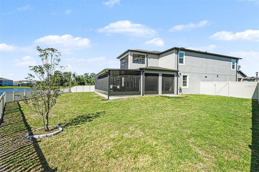 Exterior details and patio area of a home in Berry Bay, Wimauma (Image 26).