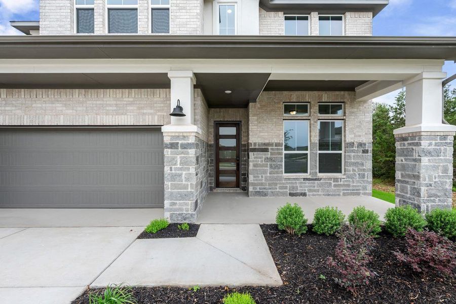 Exterior details and patio area of a home in Wolf Ranch, Georgetown (Image 25). Exterior details and patio area of a home in Wolf Ranch, Georgetown (Image 25).