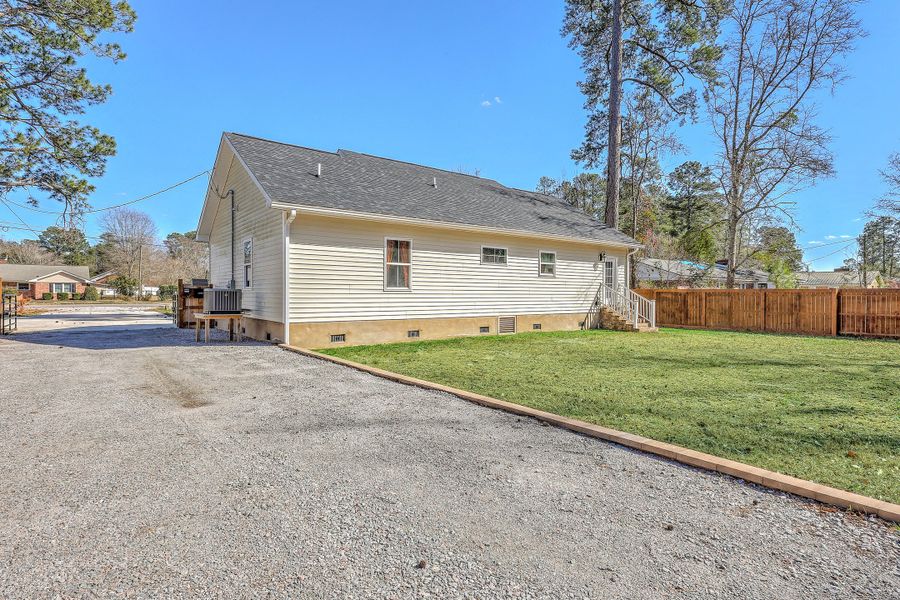 Exterior details and patio area of a home in , Holly Hill (Image 25). Exterior details and patio area of a home in , Holly Hill (Image 25).