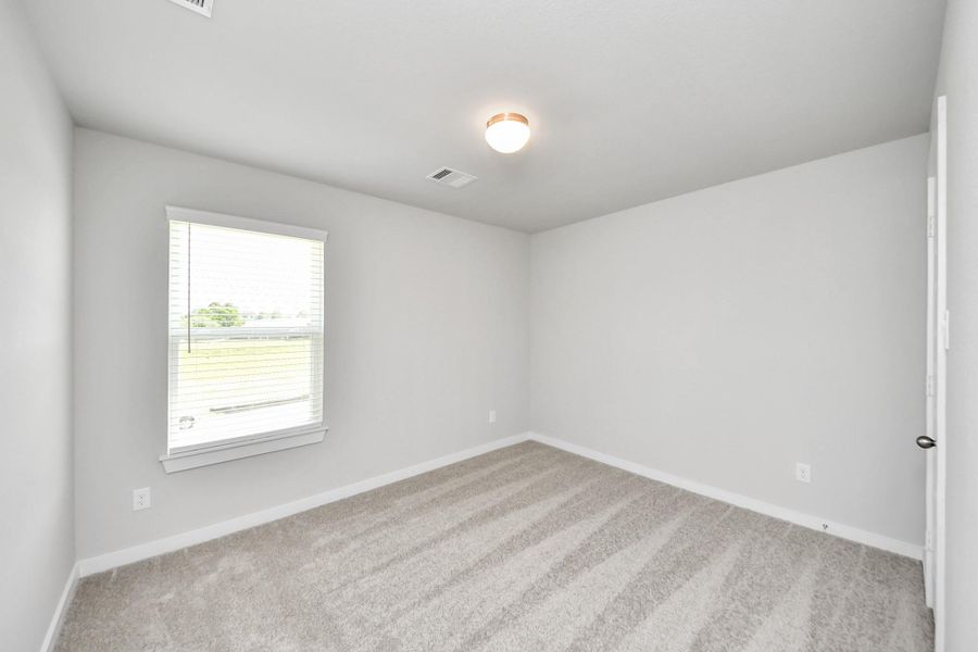 Generously sized secondary bedrooms featuring spacious closets, soft and inviting carpeting underfoot, large windows allowing plenty of natural light, and the added touch of privacy blinds for your personal retreat. Generously sized secondary bedrooms featuring spacious closets, soft and inviting carpeting underfoot, large windows allowing plenty of natural light, and the added touch of privacy blinds for your personal retreat.