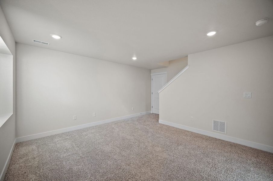 Spacious, unfurnished interior of a new home in Ridge at Lorson Ranch, Colorado Springs (Image 29).