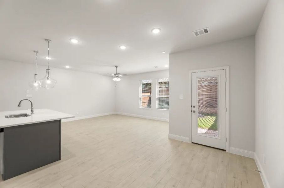 Front exterior of a new home in Sereno Oaks at Buckner Terrace, Dallas, TX, highlighting curb appeal (Image 17).