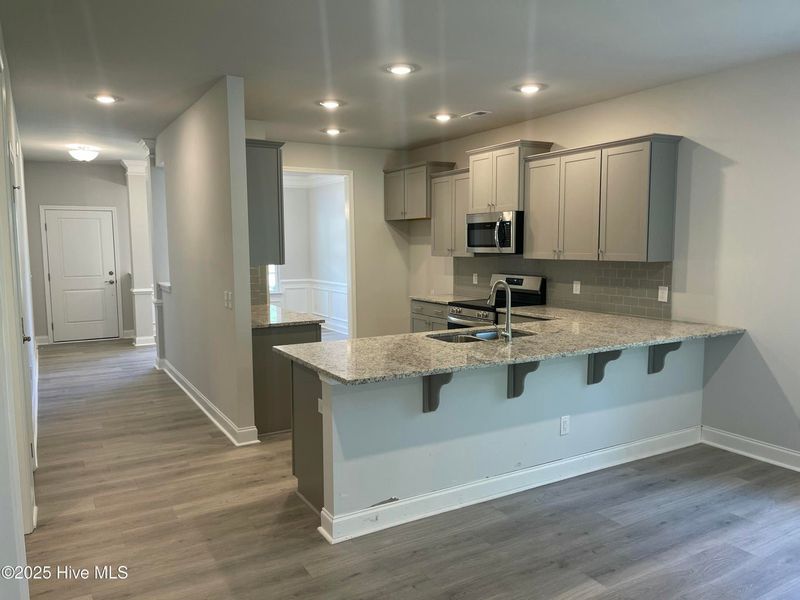 Furnished interior view inside a new home in Mill Creek Cove, Bolivia (Image 7). Furnished interior view inside a new home in Mill Creek Cove, Bolivia (Image 7).
