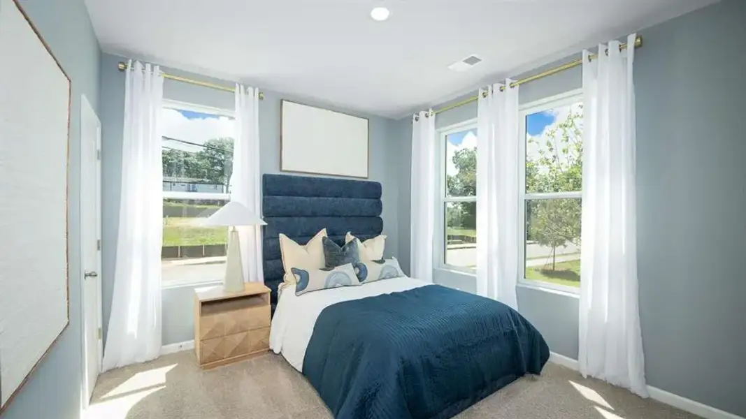 Furnished interior view inside a new home in Townes at Asbury, Hapeville (Image 5). Furnished interior view inside a new home in Townes at Asbury, Hapeville (Image 5).