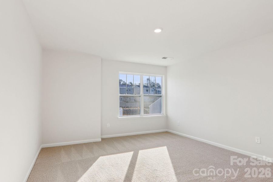 Spacious, unfurnished interior of a new home in Rydele Heights, Asheville (Image 24).