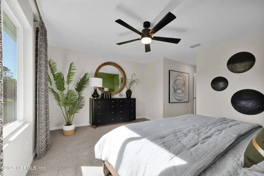 Furnished interior view inside a new home in Baxley Villas, Middleburg (Image 3).