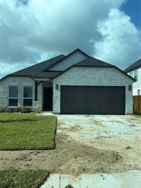 Front exterior of a new home in Huntington Place, Rosharon, TX, highlighting curb appeal (Image 20).
