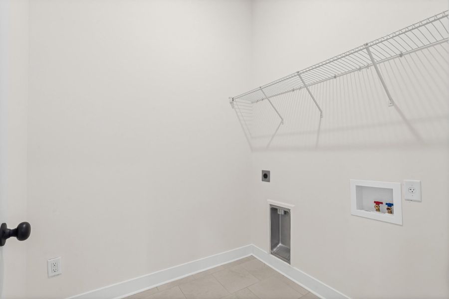 Laundry room featuring hookup for an electric dryer and washer hookup Laundry room featuring hookup for an electric dryer and washer hookup