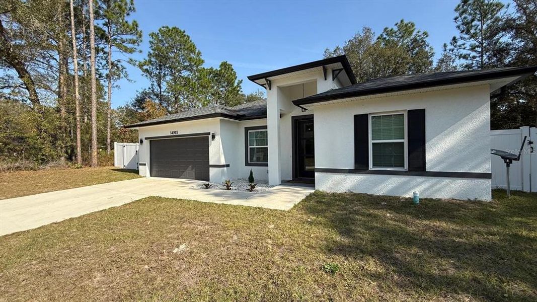 Front exterior of a new home in , Ocala, FL, highlighting curb appeal (Image 20).