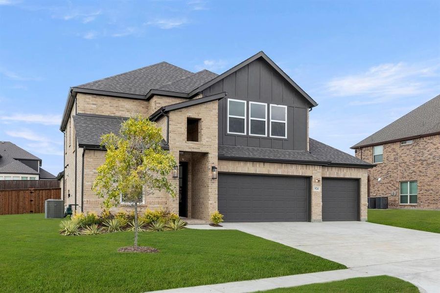 Front exterior of a new home in Grayhawk Addition, Forney, TX, highlighting curb appeal (Image 2).