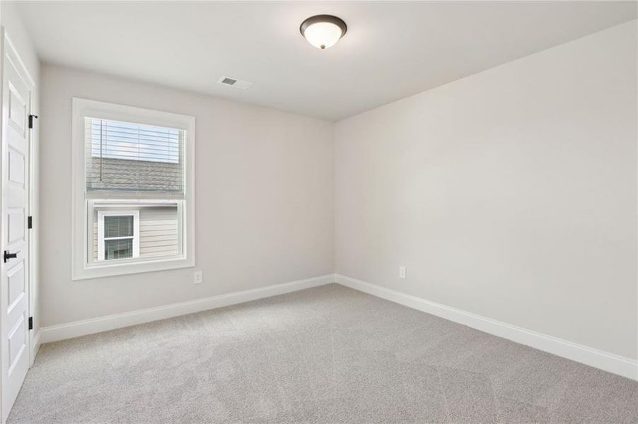 Spacious, unfurnished interior of a new home in Hemingway - Reserve Series, Cumming (Image 48).