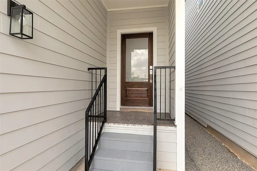 Exterior details and patio area of a home in , Houston (Image 3).